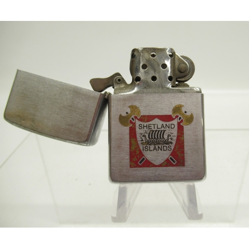 312 - Zippo 'Statue of Liberty' lighter and eight other Zippo lighters

Bradley's shipping £33.00 plus vat... 