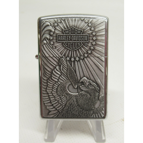 314 - Four Zippo Harley Davidson lighters and four other Zippo lighters

Bradley's shipping £33.00 plus va... 