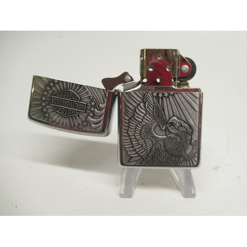 314 - Four Zippo Harley Davidson lighters and four other Zippo lighters

Bradley's shipping £33.00 plus va... 