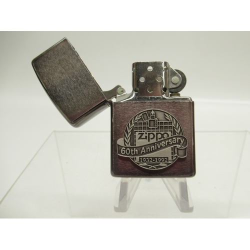 303 - Zippo '60th Anniversary 1932-1992' lighter in original presentation tin, Zippo '80th Anniversary Edi... 