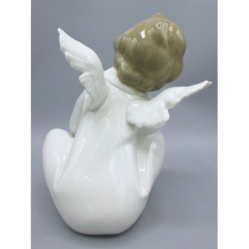 874 - Three Lladro porcelain angelic figures inc. 'Mime Angel' (no. 4959) depicted standing with a puzzled... 