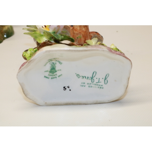 865 - Collection of Crown Staffordshire birds, modelled by J T Jones, max. H14cm (16)

Bradleys Shipping £... 