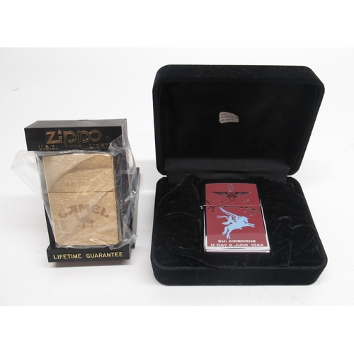 287 - Zippo '6th Airborne, D Day 6th June 1944' chrome lighter and Zippo 'Camel' brushed brass lighter

Br... 