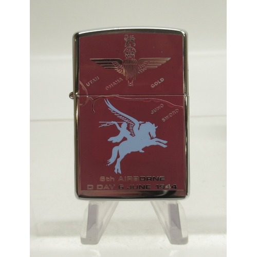 287 - Zippo '6th Airborne, D Day 6th June 1944' chrome lighter and Zippo 'Camel' brushed brass lighter

Br... 