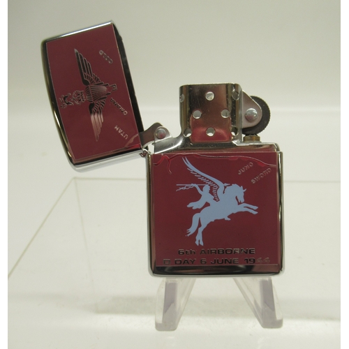 287 - Zippo '6th Airborne, D Day 6th June 1944' chrome lighter and Zippo 'Camel' brushed brass lighter

Br... 