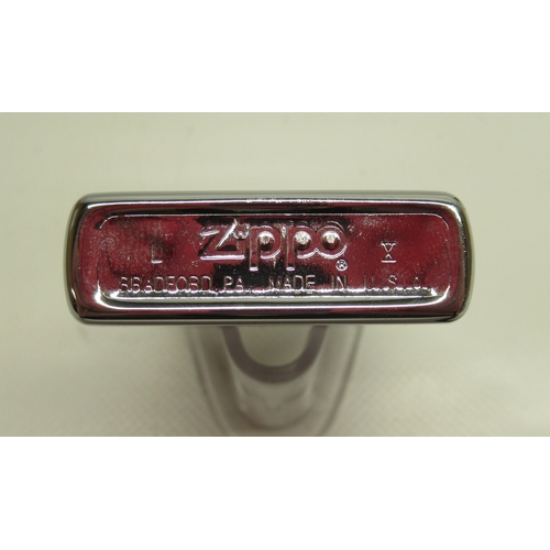 287 - Zippo '6th Airborne, D Day 6th June 1944' chrome lighter and Zippo 'Camel' brushed brass lighter

Br... 