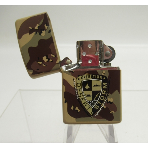 299 - Zippo 'Operation Desert Storm' camouflage lighter'; Zippo 'United States of America' chrome lighter ... 