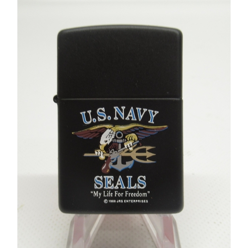 299 - Zippo 'Operation Desert Storm' camouflage lighter'; Zippo 'United States of America' chrome lighter ... 