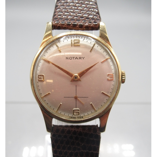 271 - Rotary 9ct gold wristwatch on brown leather strap, signed silver dial with Arabic and baton indices ... 