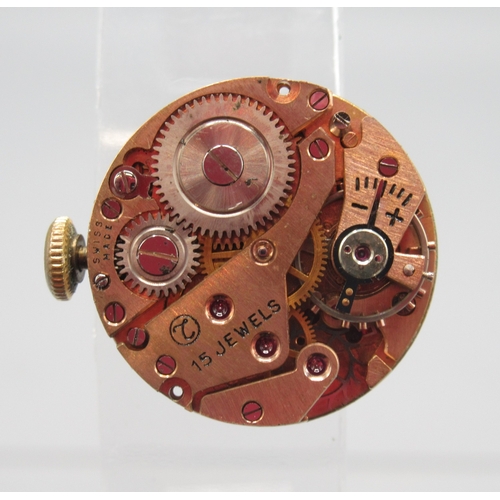 273 - Trident ladies 9ct gold wristwatch on Montal gold plated bracelet, signed cream dial with baton indi... 