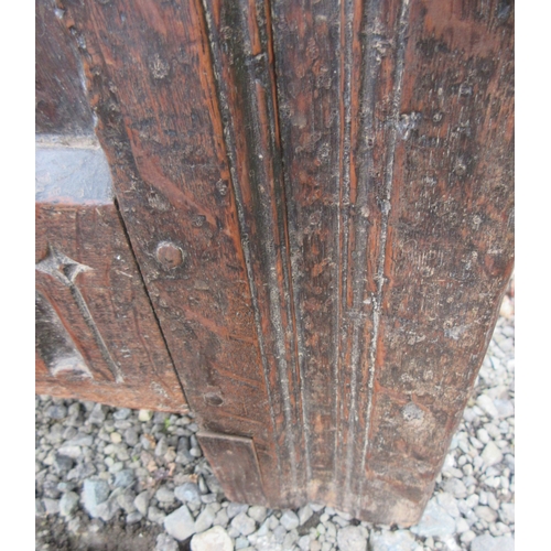 353 - 18th century oak coffer, planked top and three  lozenge carved panel front, W137cm D57cm H66cm

Ship... 