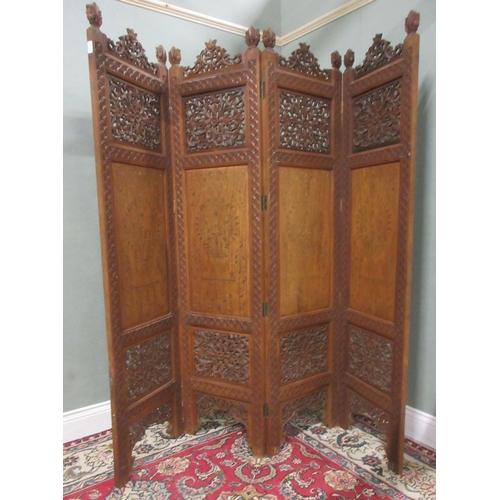 378 - 20th century three fold hardwood screen, the four panels pierced and brass inlaid with carved cresti... 