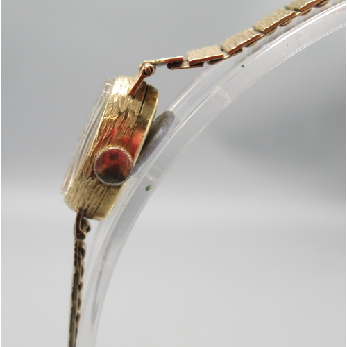 321 - Rotary ladies 9ct gold wristwatch on matching integrated bark bracelet, Birmingham 1972, signed silv... 