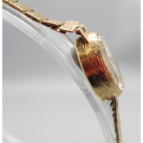 321 - Rotary ladies 9ct gold wristwatch on matching integrated bark bracelet, Birmingham 1972, signed silv... 