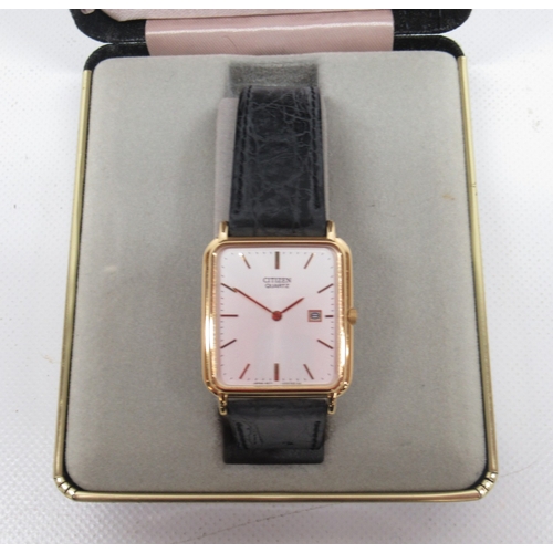 613 - Citizen gold plated quartz tank wristwatch with date, signed silver dial with baton indices, engrave... 