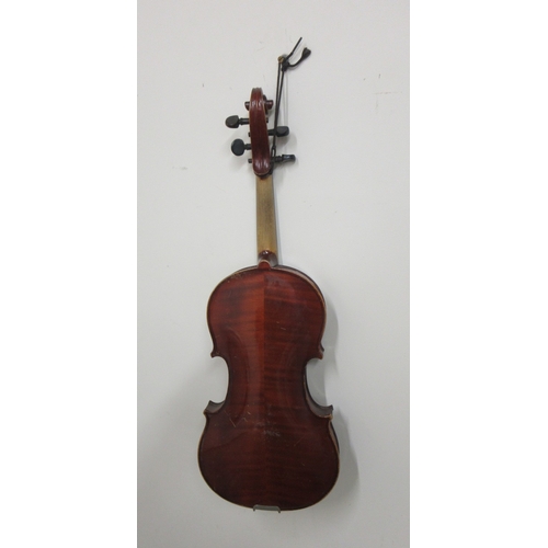 674A - 20th century violin with two piece back and faux label for 1651, L59cm and a bow L71cm (2)

Bradleys... 