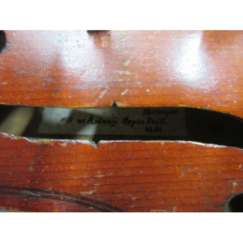 674A - 20th century violin with two piece back and faux label for 1651, L59cm and a bow L71cm (2)

Bradleys... 
