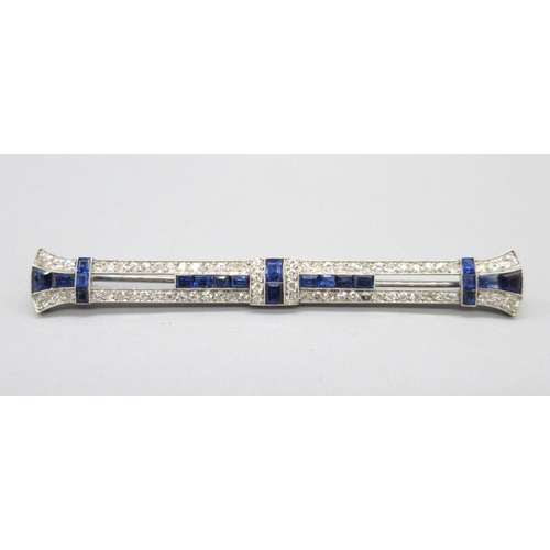 House of Marchak Art Deco diamond and sapphire bar brooch mounted in white metal, calibre cut sapphires with round brilliant-cut diamonds, signed J. Marchak. Paris. L7.5cm

Bradleys shipping £23.00 plus vat (UK Only)