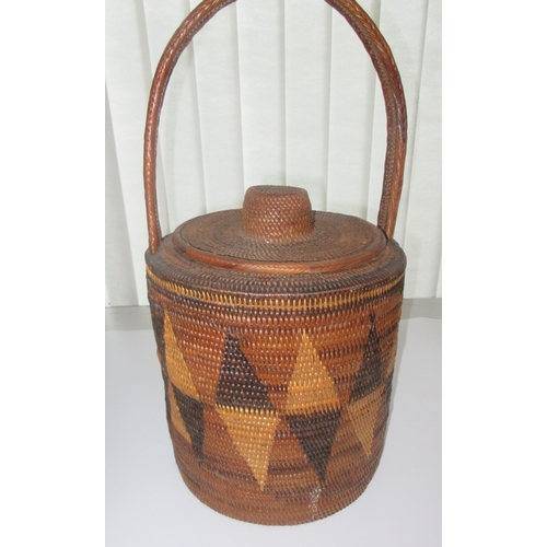 383 - Collection of tribal art. Papa New Guinea flat woven grain basket, carrying basket, lidded basket, w... 