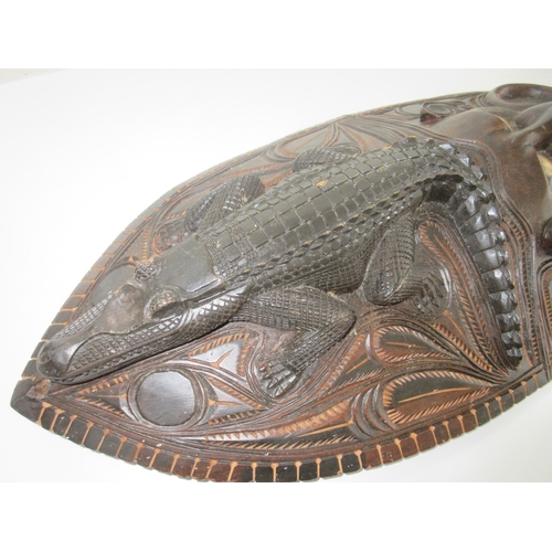 383 - Collection of tribal art. Papa New Guinea flat woven grain basket, carrying basket, lidded basket, w... 