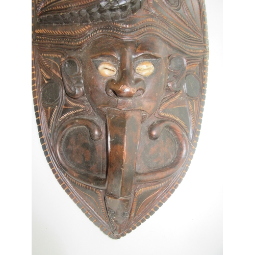 383 - Collection of tribal art. Papa New Guinea flat woven grain basket, carrying basket, lidded basket, w... 