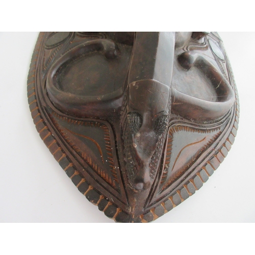 383 - Collection of tribal art. Papa New Guinea flat woven grain basket, carrying basket, lidded basket, w... 