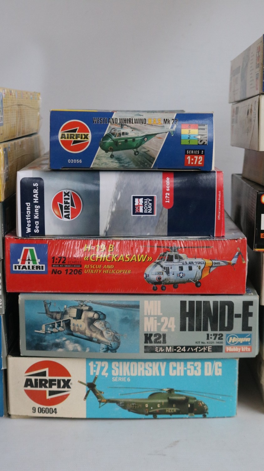 Mixed collection of thirty two 1/72 scale plastic helicopter model kits ...