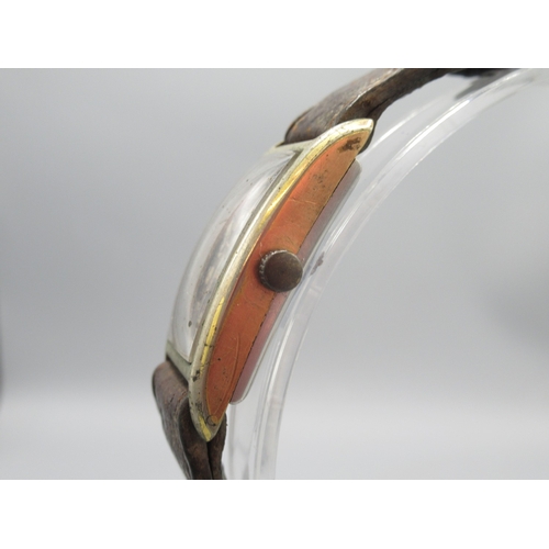 242 - Roamer plated and stainless steel tank case wristwatch on period leather strap, signed black Arabic ... 