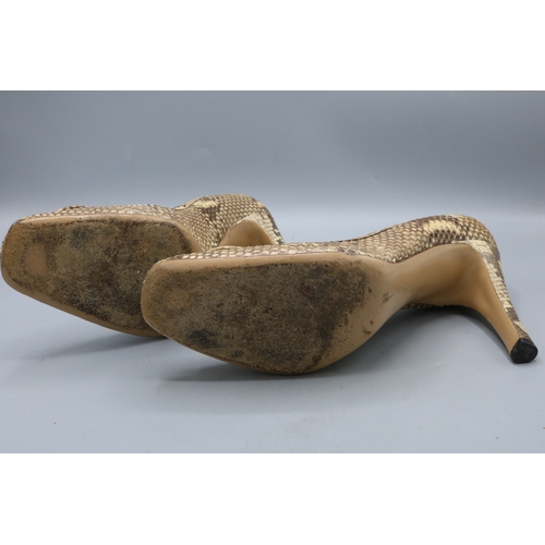 Pair of Gucci beige python GG square toe heeled shoes, size 39C ...