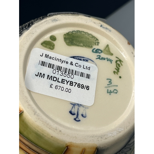 486 - Moorcroft Pottery ginger jar with lid, piped rural scene of a train and a bus travelling across moor... 