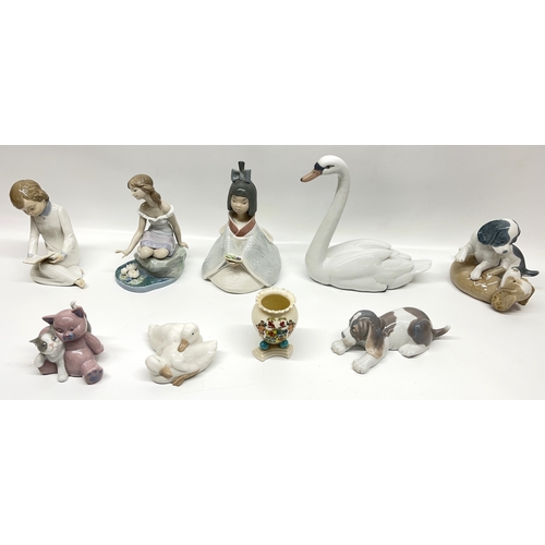 631 - Collection of Lladro figures incl. Reflections of Helena figure, Geisha, etc. and a small Goss crest... 