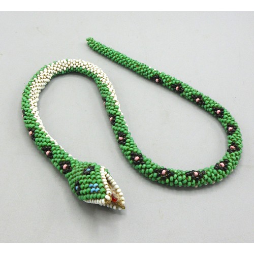 632 - Turkish prisoner of war snake, green black and pink floral beaded snake, L51cm

Bradley's shipping £... 