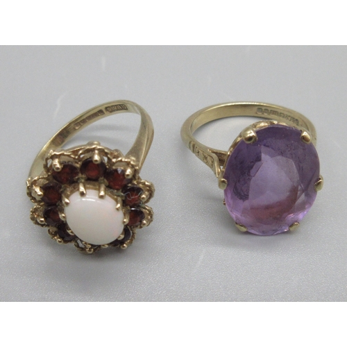 30 - 9ct yellow gold ring, opal set with a halo of garnets, stamped 375, size O, 9ct yellow gold ring set... 