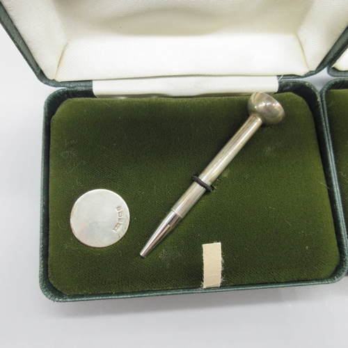 50 - Two cased 20th century silver gold tee's with markers by William Manton, Birmingham 1989, 0.6ozt

Br... 