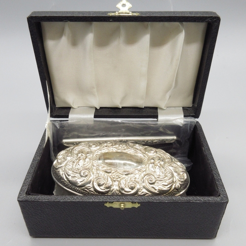 52 - 20th century silver mounted brush and comb, decorated with scrolling foliate repousse by W I Broadwa... 