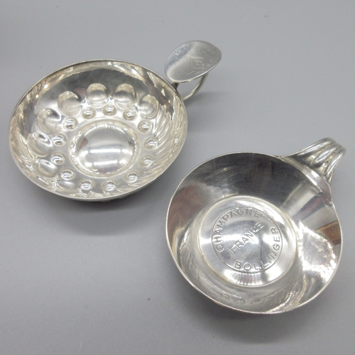 58 - Silver plate Bollinger Champagne taster, and an unmarked white metal wine taster with coat of arms t... 