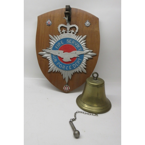 673 - Fire Service Air Force Department brass bell, on oak shield shaped bracket, H53cm

Bradley's shippin... 