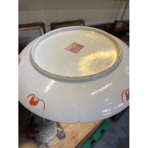 213 - Famillie Rose porcelain dish, hand painted with ribbon tied ruyi scepter bordered by flowers, stampe... 