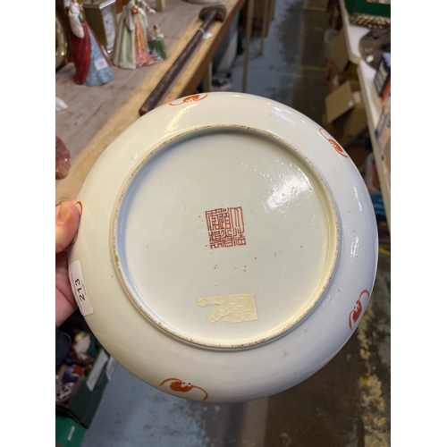 213 - Famillie Rose porcelain dish, hand painted with ribbon tied ruyi scepter bordered by flowers, stampe... 