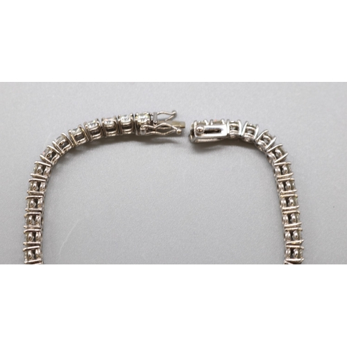 1293 - Multi-stone diamond white metal tennis bracelet, L 16.5cm

Bradley's shipping £23.00 plus vat (UK On... 