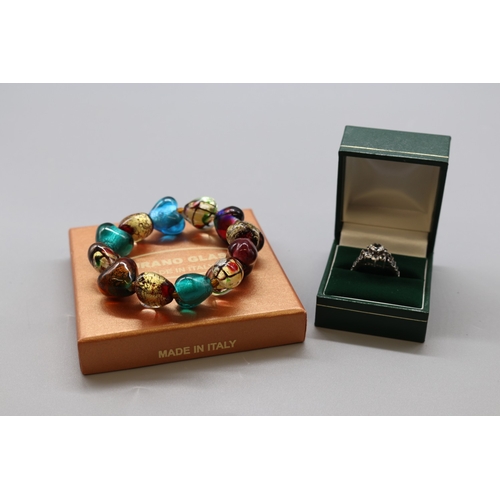 29 - Silver and 9ct floral cluster ring, set with Clear stones, size O 1/2 (3.6g) and a Murano glass 12 l... 