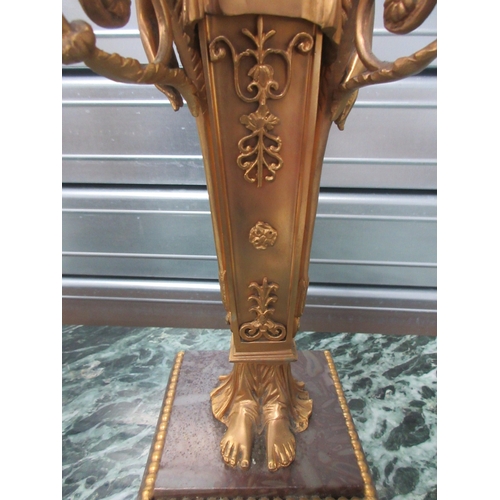 1387 - Pair of Regency style gilt metal figural candelabra, on marble bases with paw feet, H45cm (2)

Bradl... 