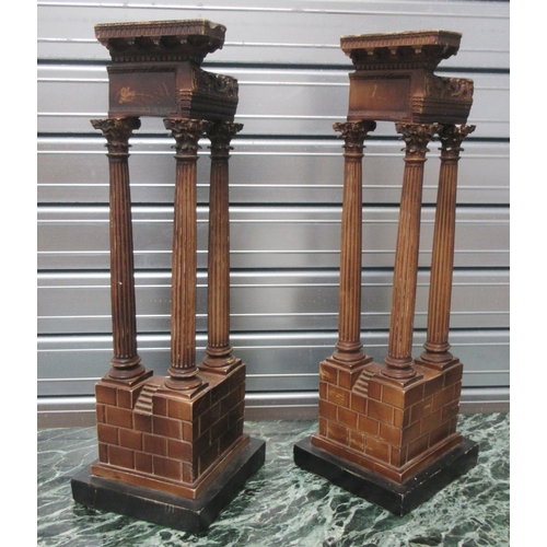 1388 - Pair of resin Grand Tour style models of Temple ruins, on square bases, W20cm D20cm H57cm (2)

Bradl... 