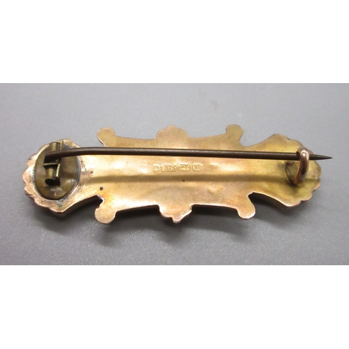 57 - 9ct hallmarked brooch and another 9ct hallmarked brooch (5.6g)

Bradley's shipping £23.00 plus vat (... 