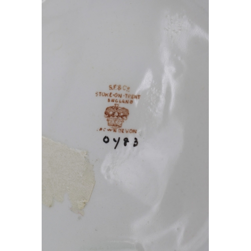 654 - Large Crown Devon jug painted with Highland cattle, signed G. Cox, gilt rim and handle, H33.5cm

Bra... 