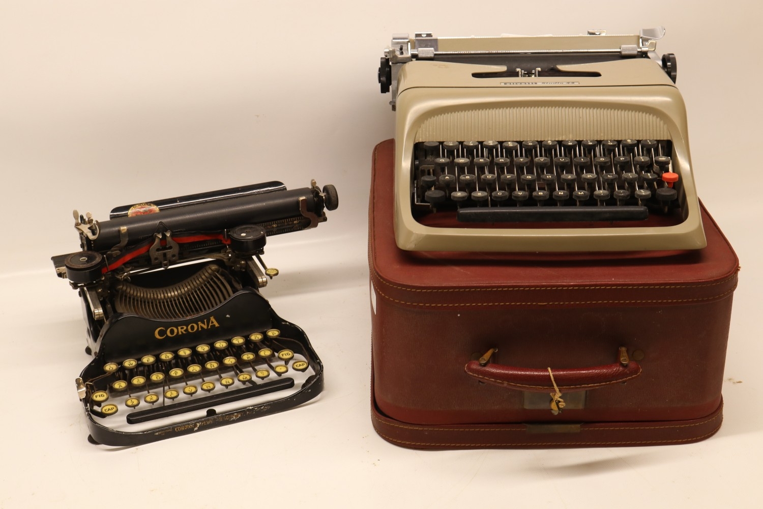 Two typewriters incl. early 20th Century Corona typewriter, with ...