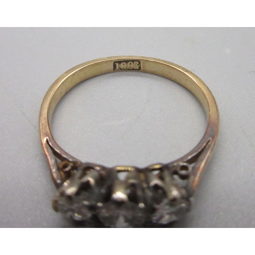 44 - 18ct stamped 3 stone ring, size I 1/2 (1.7g)

Bradley's shipping £20.00 plus vat (UK Only)