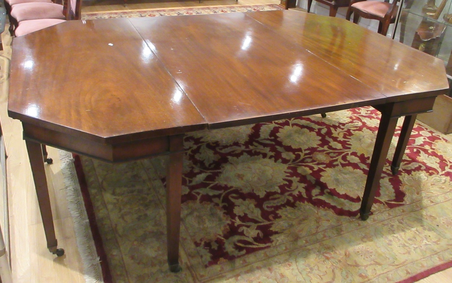 Regency style mahogany rectangular dining table, angular ends with ...