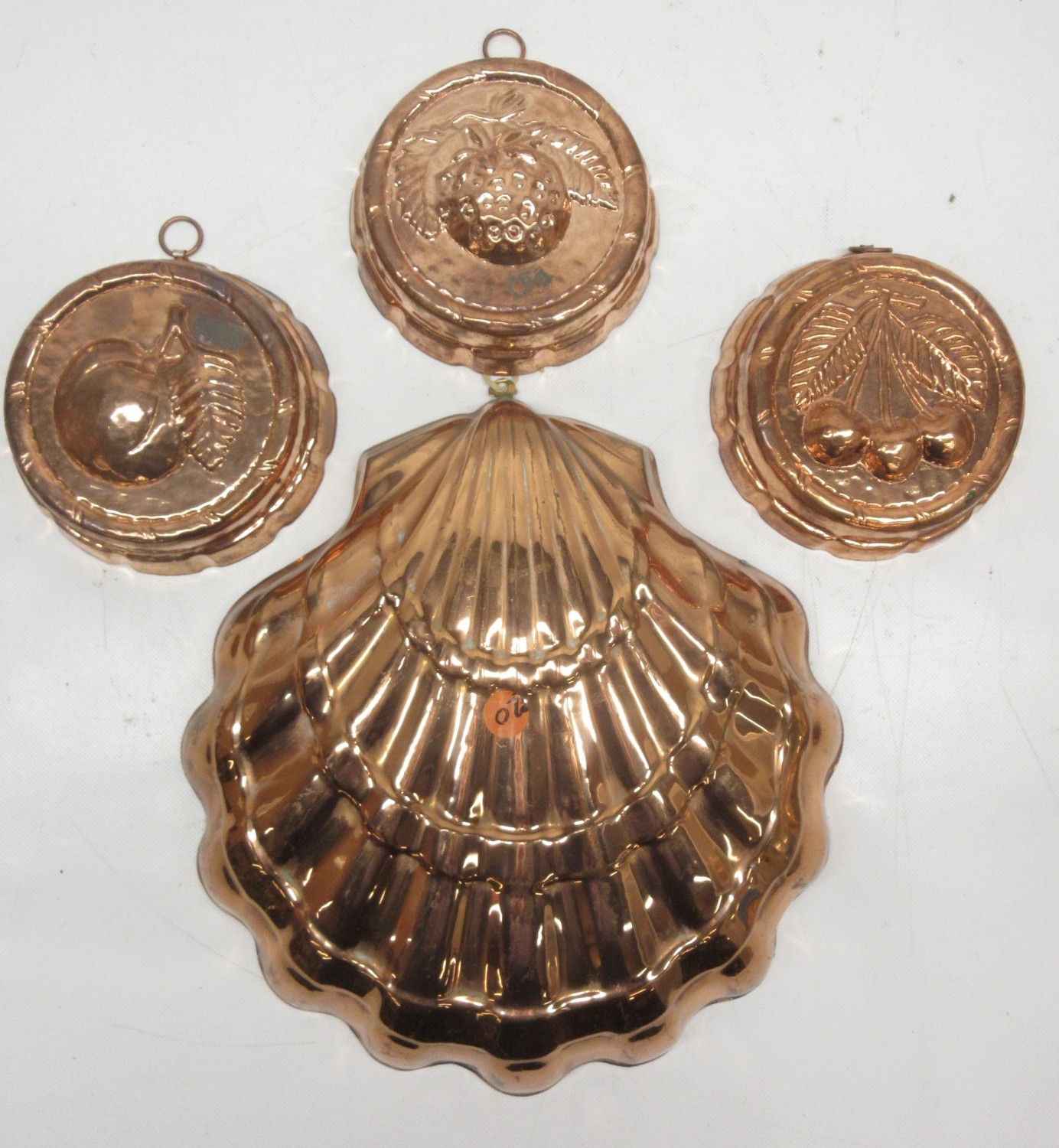 Large collection of modern copperware jelly moulds, flan dishes, mousse ...