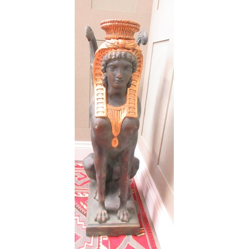 1377 - Style of S. Chenu - a pair of Egyptian Revival style composite Sphinx pier table supports, on rectan... 